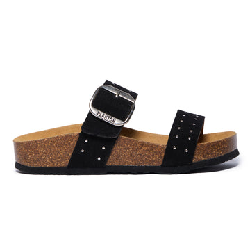Black Plakton CP Claire sandal with two suede straps, one featuring a large bronze buckle, cork and Memory Foam footbed, and a black lightweight sole.